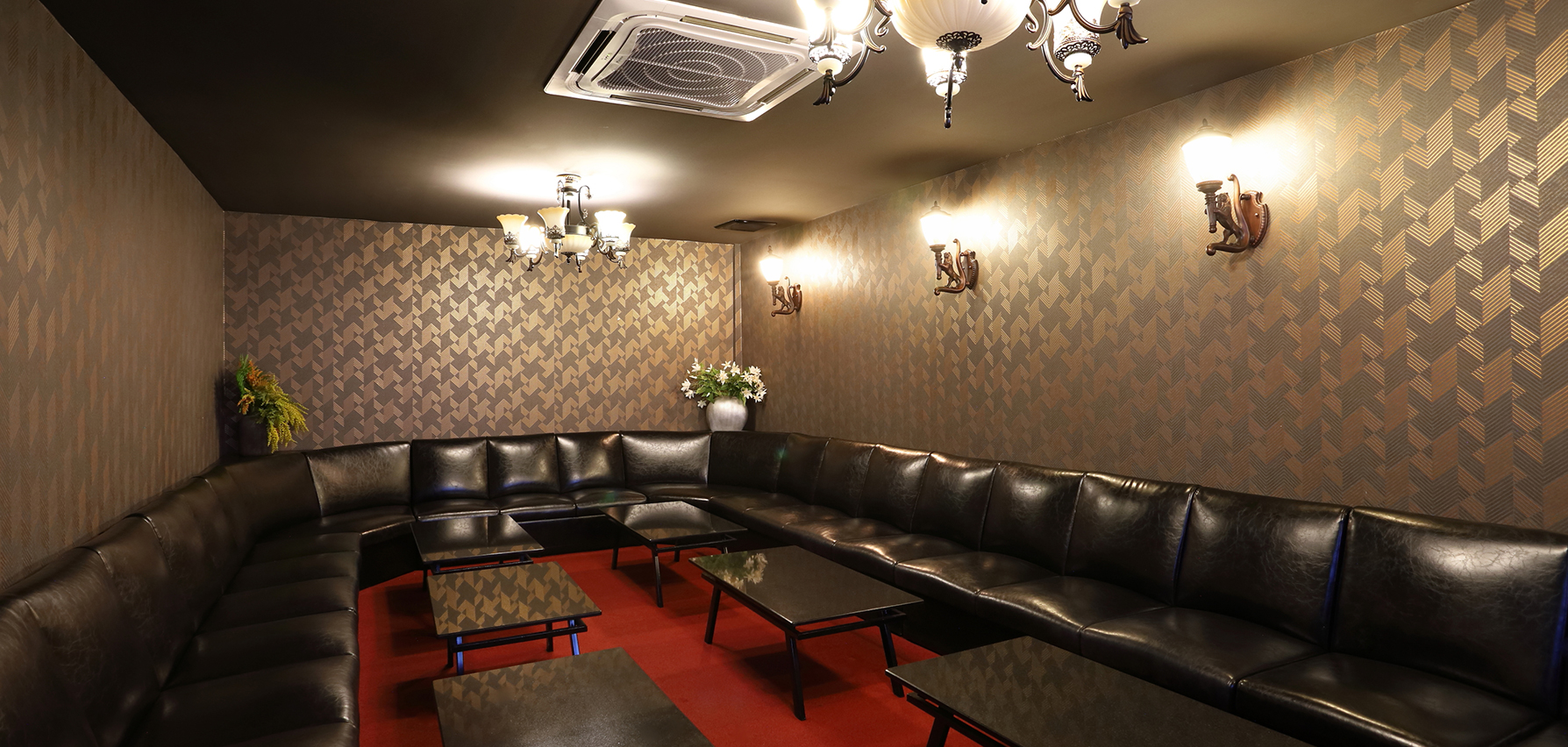 1st floor private karaoke room, warm wood interior