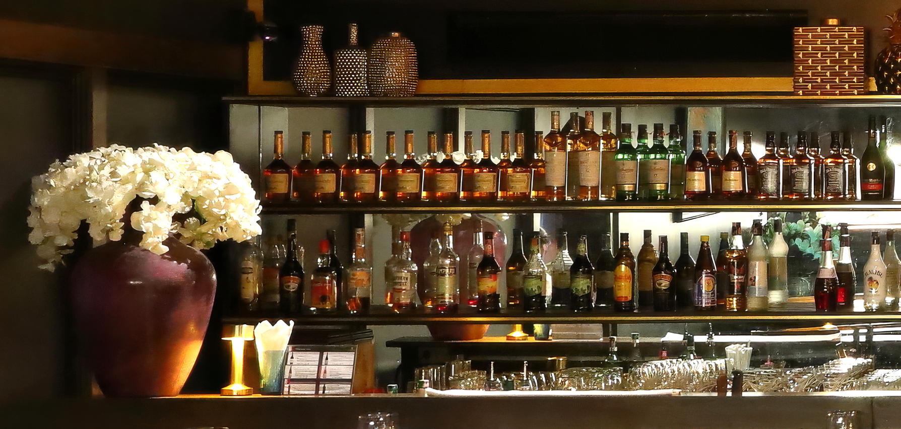 Liquor shelf at SHE